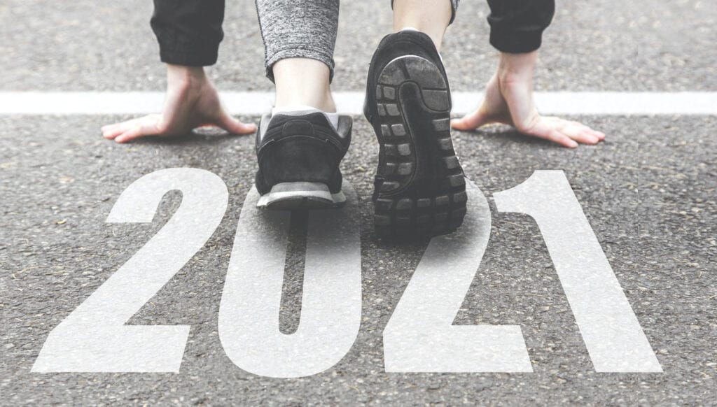 running shoes on pavement 2021